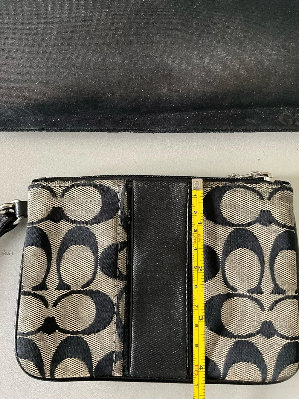 Coach Signature Canvas Wristlet in Black and Tan